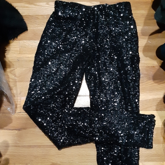 H&M Pants - Gorgeous black sequin pants with side zipper.